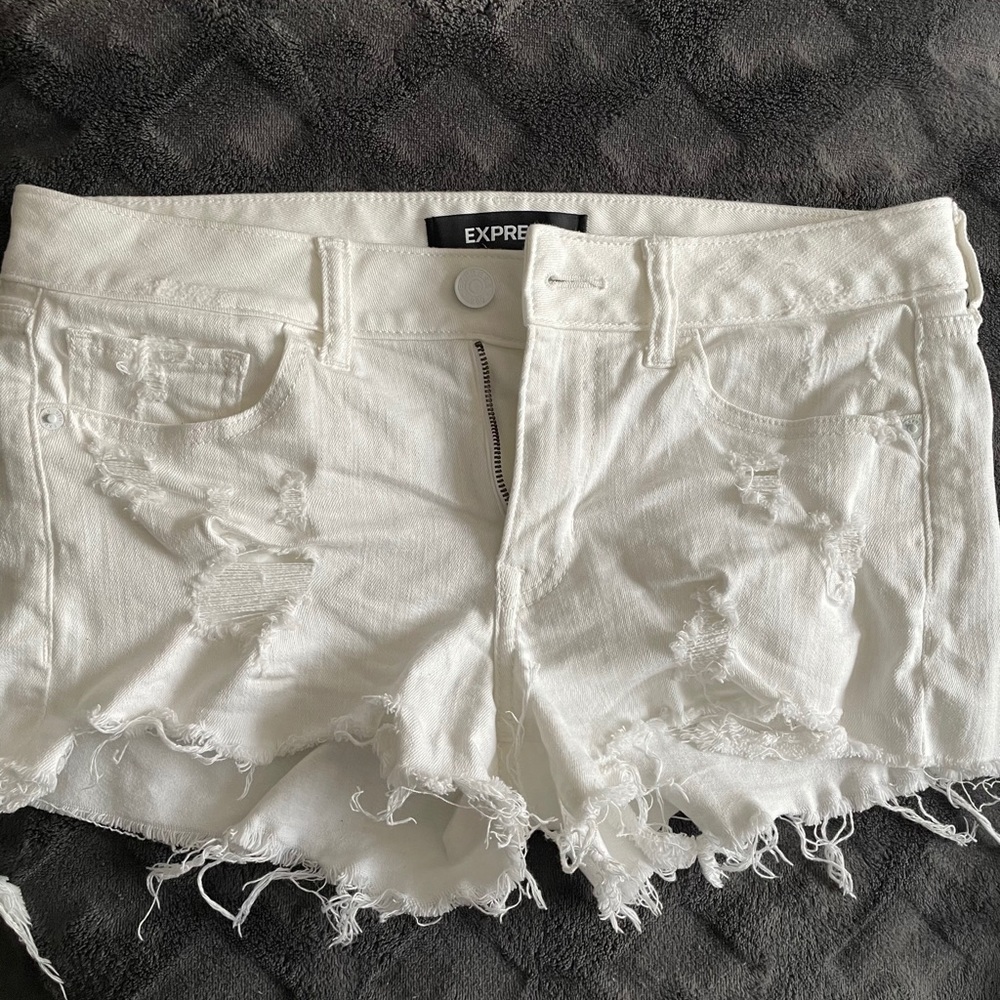White distressed shorts